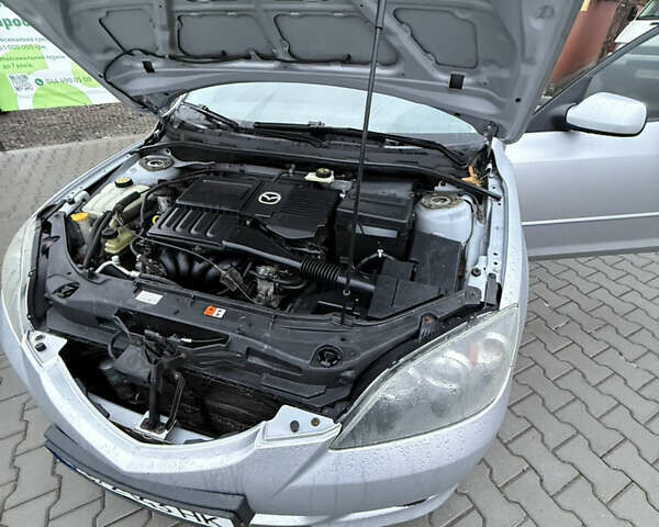 Сірий Мазда 3, об'ємом двигуна 1.6 л та пробігом 176 тис. км за 4800 $, фото 17 на Automoto.ua