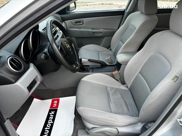 Сірий Мазда 3, об'ємом двигуна 1.4 л та пробігом 198 тис. км за 5490 $, фото 13 на Automoto.ua