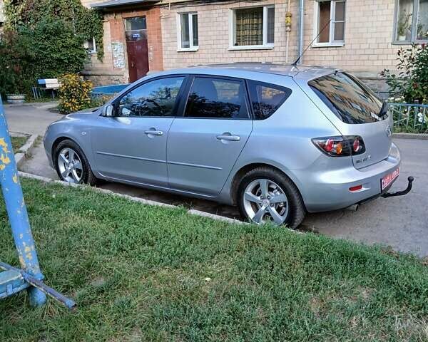 Сірий Мазда 3, об'ємом двигуна 1.6 л та пробігом 181 тис. км за 4650 $, фото 5 на Automoto.ua