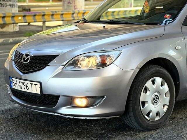 Серый Мазда 3, объемом двигателя 1.6 л и пробегом 255 тыс. км за 4350 $, фото 3 на Automoto.ua