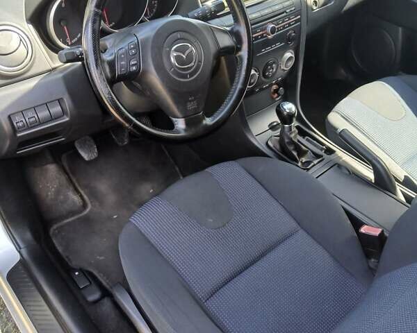 Сірий Мазда 3, об'ємом двигуна 1.6 л та пробігом 181 тис. км за 4650 $, фото 28 на Automoto.ua
