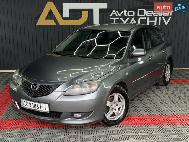 Серый Мазда 3, объемом двигателя 1.6 л и пробегом 301 тыс. км за 3400 $, фото 7 на Automoto.ua