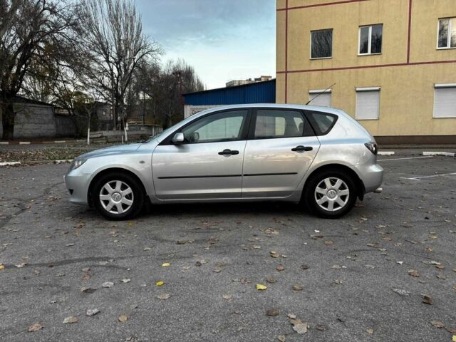 Серый Мазда 3, объемом двигателя 1.4 л и пробегом 198 тыс. км за 5490 $, фото 3 на Automoto.ua