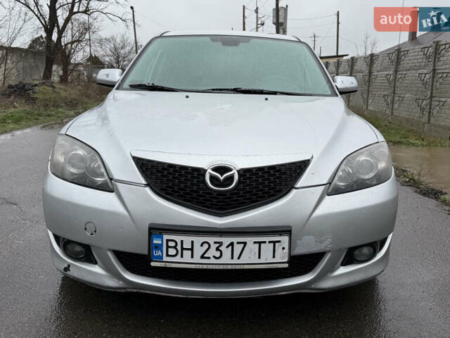 Сірий Мазда 3, об'ємом двигуна 1.4 л та пробігом 284 тис. км за 4150 $, фото 2 на Automoto.ua