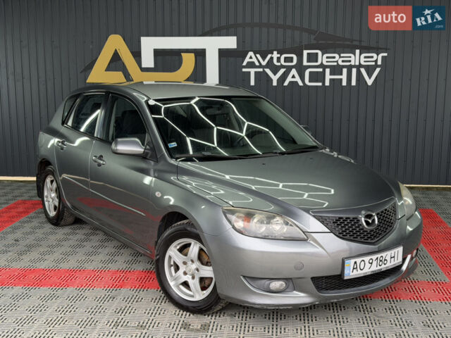 Серый Мазда 3, объемом двигателя 1.6 л и пробегом 301 тыс. км за 3400 $, фото 5 на Automoto.ua