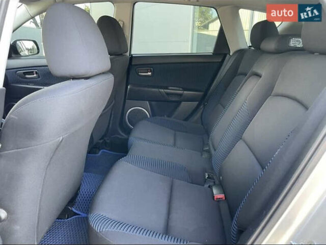 Серый Мазда 3, объемом двигателя 2 л и пробегом 191 тыс. км за 4100 $, фото 12 на Automoto.ua
