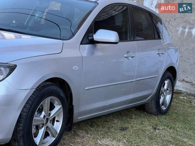 Сірий Мазда 3, об'ємом двигуна 1.6 л та пробігом 268 тис. км за 5199 $, фото 11 на Automoto.ua