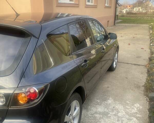 Сірий Мазда 3, об'ємом двигуна 1.56 л та пробігом 330 тис. км за 3999 $, фото 3 на Automoto.ua