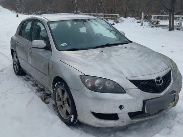 Серый Мазда 3, объемом двигателя 1.6 л и пробегом 237 тыс. км за 1100 $, фото 3 на Automoto.ua