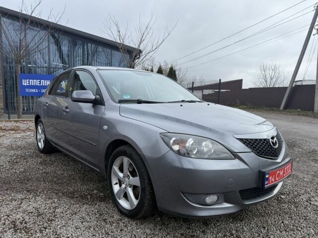 Серый Мазда 3, объемом двигателя 1.6 л и пробегом 207 тыс. км за 4600 $, фото 1 на Automoto.ua