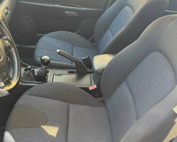 Сірий Мазда 3, об'ємом двигуна 1.6 л та пробігом 181 тис. км за 4650 $, фото 12 на Automoto.ua