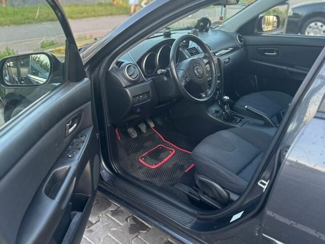 Сірий Мазда 3, об'ємом двигуна 1.6 л та пробігом 254 тис. км за 4999 $, фото 5 на Automoto.ua