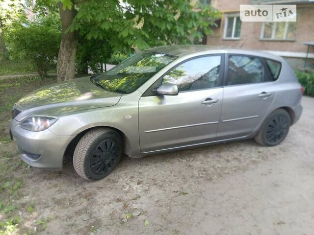 Сірий Мазда 3, об'ємом двигуна 1.4 л та пробігом 220 тис. км за 4500 $, фото 2 на Automoto.ua