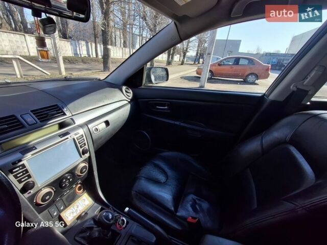 Сірий Мазда 3, об'ємом двигуна 2 л та пробігом 290 тис. км за 3900 $, фото 8 на Automoto.ua