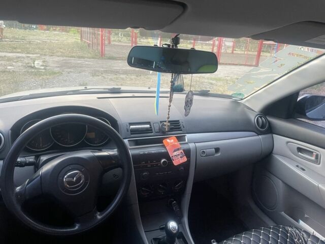 Сірий Мазда 3, об'ємом двигуна 1.3 л та пробігом 217 тис. км за 4999 $, фото 7 на Automoto.ua