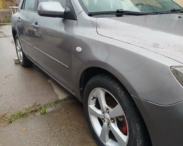 Мазда 3 2005 в Мерефа на Automoto.ua Серый Мазда 3, объемом двигателя 1.6 л и пробегом 198 тыс. км за 3900 $, фото 1 на Automoto.ua