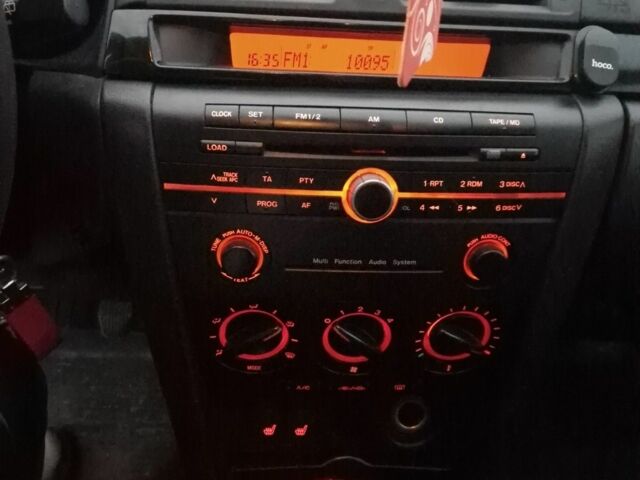 Серый Мазда 3, объемом двигателя 1.6 л и пробегом 206 тыс. км за 3950 $, фото 6 на Automoto.ua