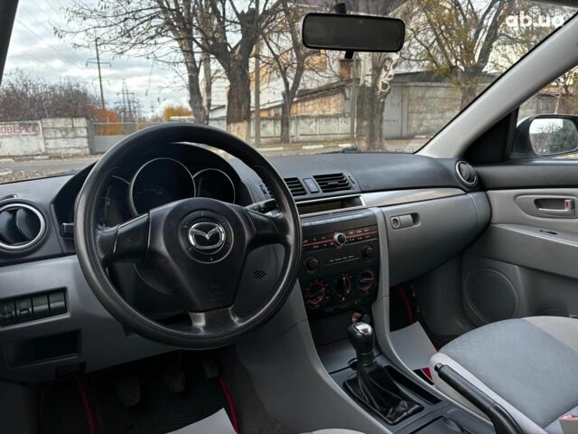Сірий Мазда 3, об'ємом двигуна 1.4 л та пробігом 198 тис. км за 5490 $, фото 15 на Automoto.ua