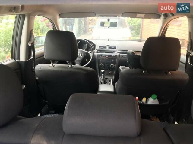 Серый Мазда 3, объемом двигателя 1.6 л и пробегом 208 тыс. км за 5000 $, фото 2 на Automoto.ua