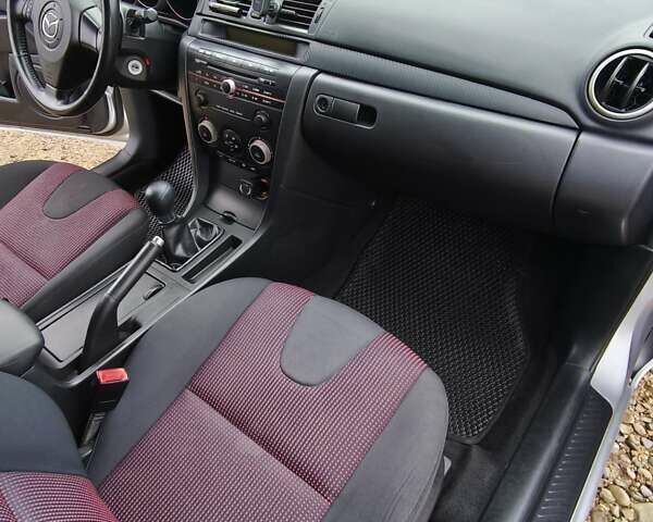 Сірий Мазда 3, об'ємом двигуна 1.6 л та пробігом 263 тис. км за 4700 $, фото 12 на Automoto.ua