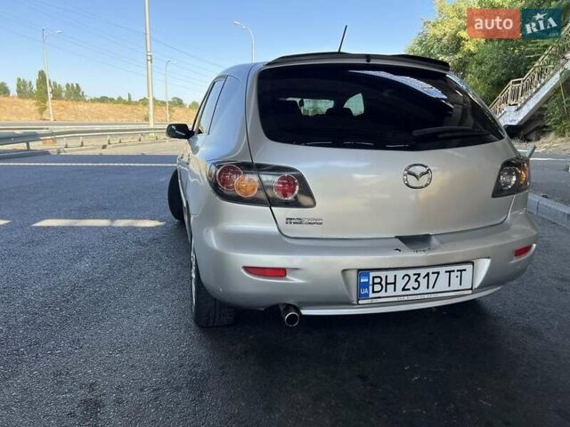 Серый Мазда 3, объемом двигателя 1.3 л и пробегом 282 тыс. км за 3800 $, фото 4 на Automoto.ua