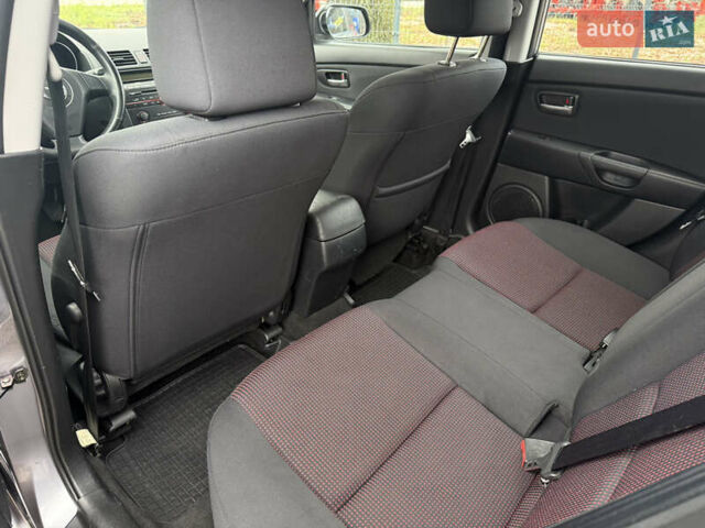 Серый Мазда 3, объемом двигателя 1.6 л и пробегом 207 тыс. км за 4600 $, фото 33 на Automoto.ua