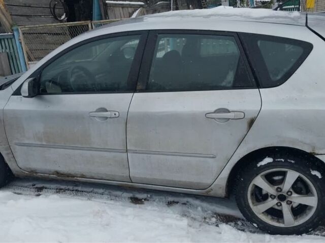 Серый Мазда 3, объемом двигателя 1.6 л и пробегом 237 тыс. км за 1100 $, фото 1 на Automoto.ua