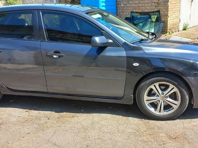 Серый Мазда 3, объемом двигателя 1.6 л и пробегом 365 тыс. км за 2600 $, фото 6 на Automoto.ua
