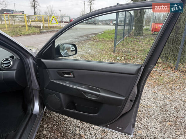 Серый Мазда 3, объемом двигателя 1.6 л и пробегом 207 тыс. км за 4600 $, фото 27 на Automoto.ua