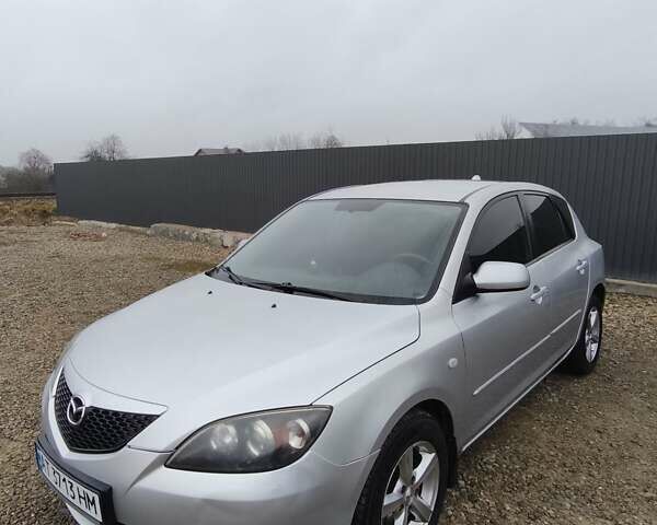 Сірий Мазда 3, об'ємом двигуна 1.6 л та пробігом 263 тис. км за 4700 $, фото 1 на Automoto.ua