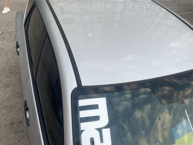 Сірий Мазда 3, об'ємом двигуна 1.3 л та пробігом 217 тис. км за 4999 $, фото 2 на Automoto.ua