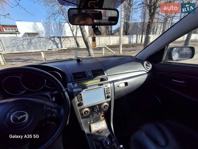 Сірий Мазда 3, об'ємом двигуна 2 л та пробігом 290 тис. км за 3900 $, фото 1 на Automoto.ua