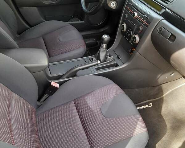 Серый Мазда 3, объемом двигателя 1.6 л и пробегом 180 тыс. км за 4650 $, фото 7 на Automoto.ua