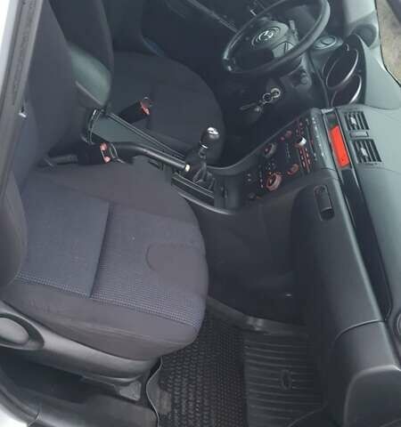 Серый Мазда 3, объемом двигателя 2 л и пробегом 245 тыс. км за 4200 $, фото 2 на Automoto.ua