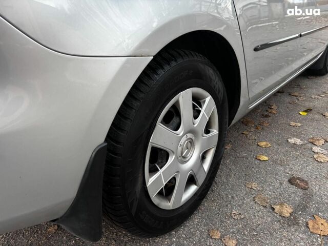 Сірий Мазда 3, об'ємом двигуна 1.4 л та пробігом 198 тис. км за 5490 $, фото 10 на Automoto.ua