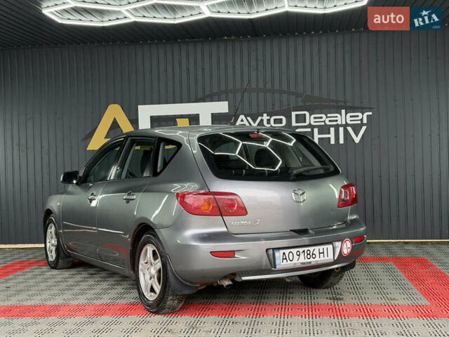 Сірий Мазда 3, об'ємом двигуна 1.6 л та пробігом 301 тис. км за 3400 $, фото 18 на Automoto.ua