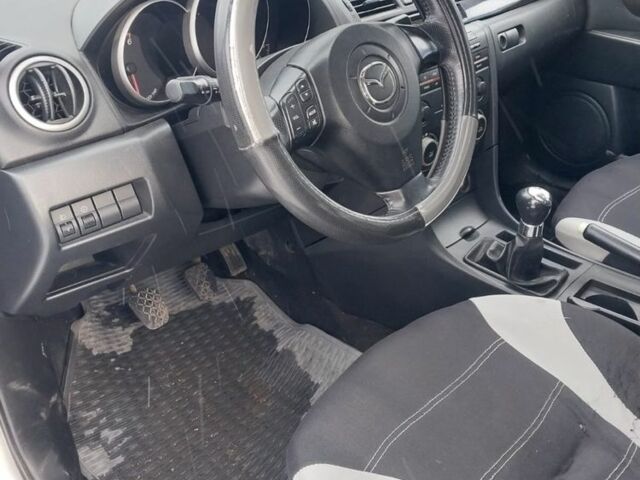 Серый Мазда 3, объемом двигателя 1.6 л и пробегом 237 тыс. км за 1100 $, фото 6 на Automoto.ua