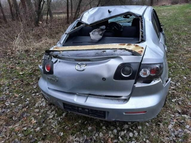 Серый Мазда 3, объемом двигателя 1.6 л и пробегом 380 тыс. км за 2000 $, фото 1 на Automoto.ua