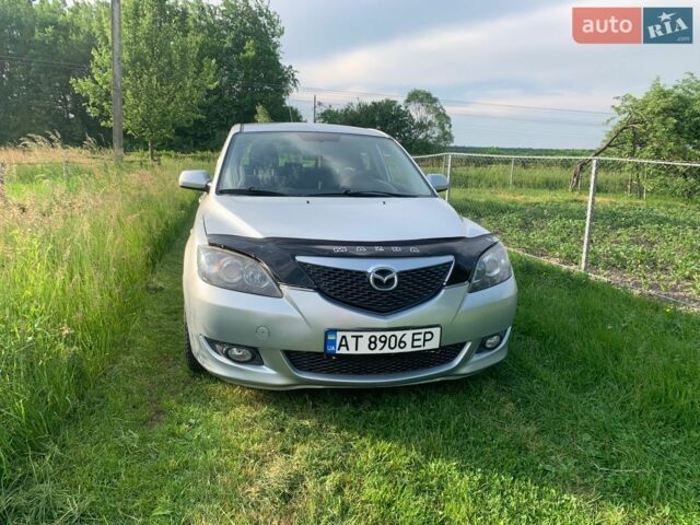 Сірий Мазда 3, об'ємом двигуна 1.56 л та пробігом 223 тис. км за 2999 $, фото 9 на Automoto.ua