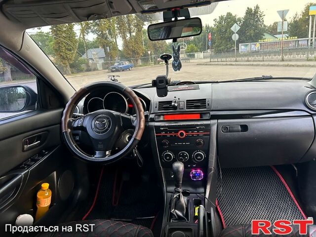 Сірий Мазда 3, об'ємом двигуна 2 л та пробігом 411 тис. км за 4200 $, фото 10 на Automoto.ua