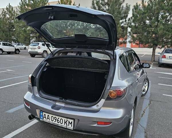 Серый Мазда 3, объемом двигателя 1.6 л и пробегом 235 тыс. км за 4999 $, фото 16 на Automoto.ua