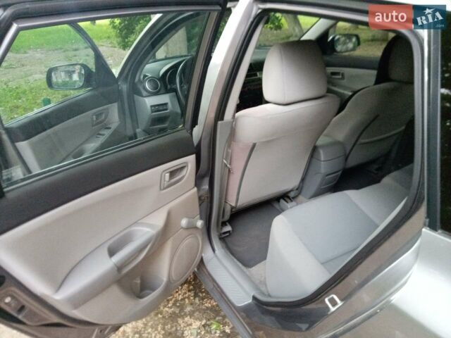 Сірий Мазда 3, об'ємом двигуна 1.4 л та пробігом 220 тис. км за 4200 $, фото 17 на Automoto.ua