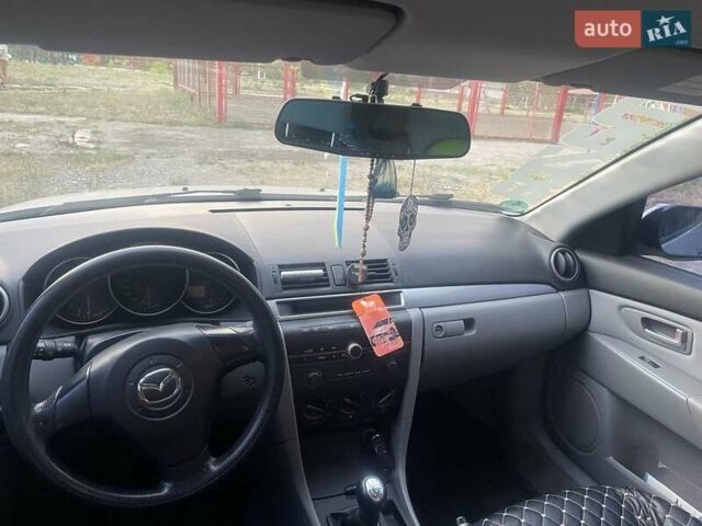 Серый Мазда 3, объемом двигателя 1.3 л и пробегом 221 тыс. км за 4999 $, фото 5 на Automoto.ua