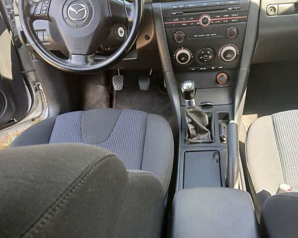 Сірий Мазда 3, об'ємом двигуна 1.6 л та пробігом 181 тис. км за 4650 $, фото 25 на Automoto.ua