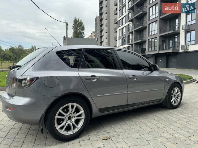 Сірий Мазда 3, об'ємом двигуна 1.56 л та пробігом 319 тис. км за 3700 $, фото 5 на Automoto.ua