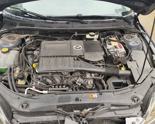 Мазда 3 2005 в Мерефа на Automoto.ua Серый Мазда 3, объемом двигателя 1.6 л и пробегом 198 тыс. км за 3900 $, фото 15 на Automoto.ua