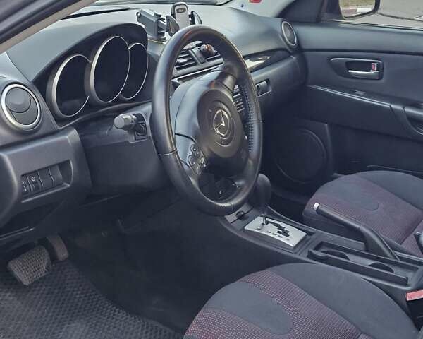 Серый Мазда 3, объемом двигателя 1.6 л и пробегом 235 тыс. км за 4999 $, фото 3 на Automoto.ua