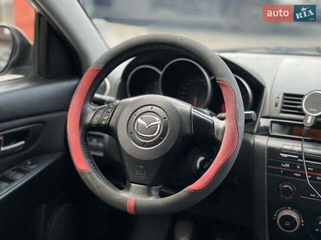 Сірий Мазда 3, об'ємом двигуна 1.6 л та пробігом 258 тис. км за 4600 $, фото 15 на Automoto.ua
