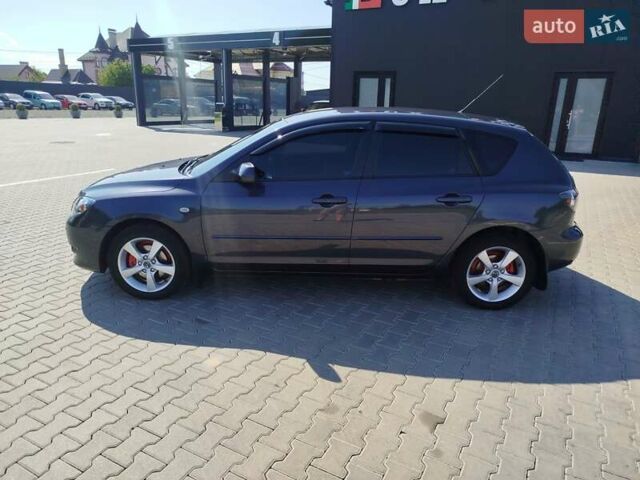 Сірий Мазда 3, об'ємом двигуна 1.6 л та пробігом 297 тис. км за 5550 $, фото 12 на Automoto.ua