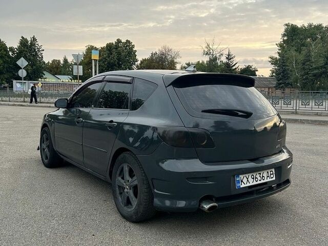 Серый Мазда 3, объемом двигателя 2 л и пробегом 411 тыс. км за 4200 $, фото 4 на Automoto.ua